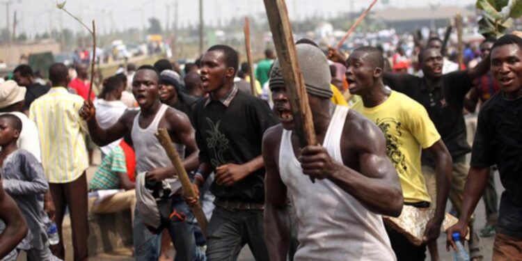 APC Thug Apprehended After Group Shot Two Persons In Segun Oni’s Campaign Convoy In Ekiti State, Nigeria