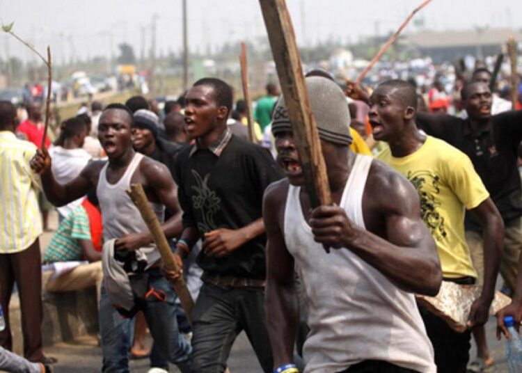 APC Thug Apprehended After Group Shot Two Persons In Segun Oni’s Campaign Convoy In Ekiti State, Nigeria